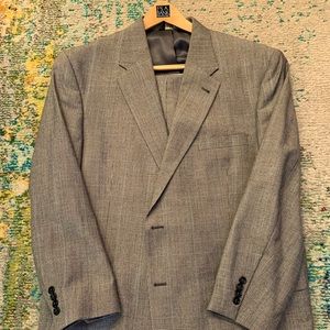 46 Reg, Traditional Cut, Blue Pinstripe, pleated front pants and single vent.